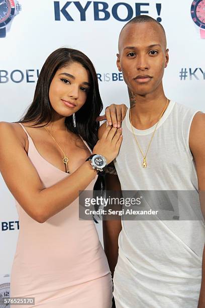 Yovanna Ventura and stylist Shaq pose at the KYBOE! Watches Miami Swim Week fashion show on July 15, 2016 in Miami Beach, Florida.