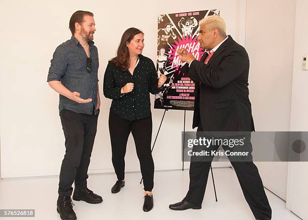 Alexandria Hammond, Lucha Libre Wresting Legend Shocker and Ian Markiewicz pose for a photo during the "Lucha Mexico" New York Premiere at the Museum...