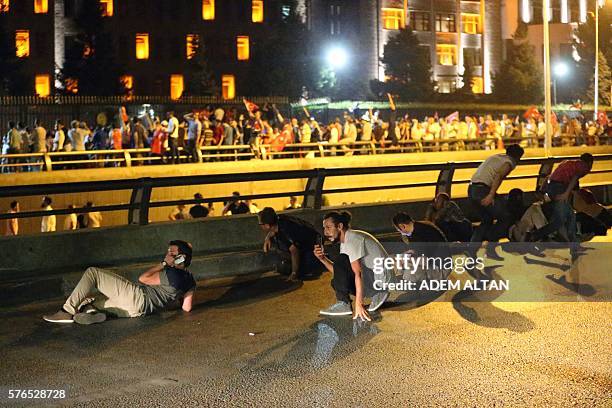 People take streets in Ankara, Turkey during a protest against military coup on July 16, 2016. Turkish military forces on July 16 opened fire on...