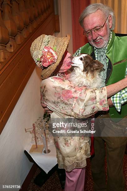 Elke Sommer and her husband Wolf Walther and dog Smiley during a bavarian evening ahead of the Kaiser Cup 2016 on July 15, 2016 in Bad Griesbach near...