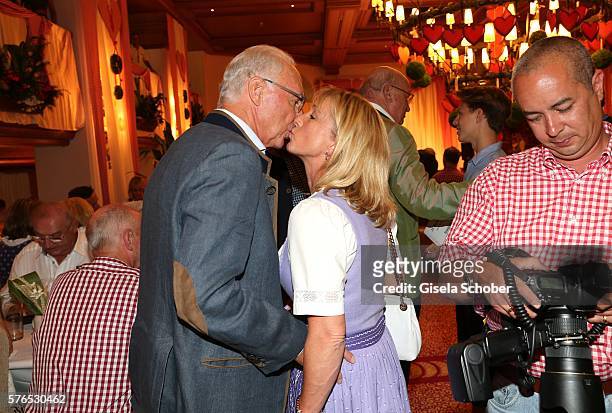 Franz Beckenbauer and his wife Heidi Beckenbauer kisses during a bavarian evening ahead of the Kaiser Cup 2016 on July 15, 2016 in Bad Griesbach near...