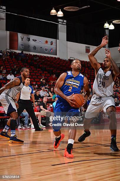 Landry Fields of the Golden State Warriors drives to the basket against the Dallas Mavericks during the 2016 NBA Las Vegas Summer League game on July...