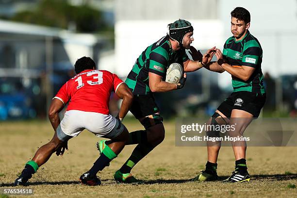 Glen Angus of Wainuiomataevades the tackle of Lote Raikabula of Marist St Pats during the Jubilee Cup Premier club rugby match between Marist St ats...