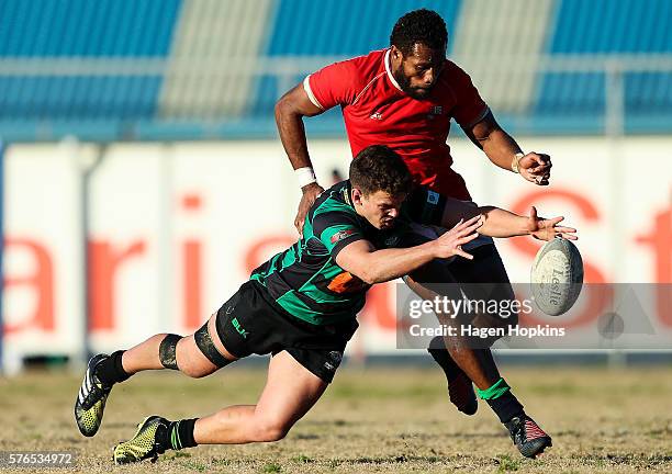 Josh Robertson-Weepu of Wainuiomata and Lote Raikabula of Marist St Pats compete for a loose ball during the Jubilee Cup Premier club rugby match...