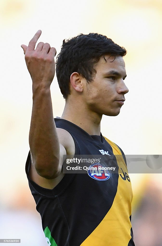 Essendon Rioli Daniel Rioli of the Tigers celebrates after kicking a goal during the ...