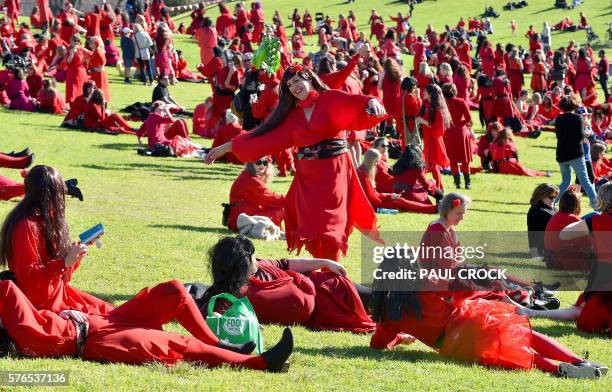 Kate Bush fans gather to rehearse a dance before performing during a celebration to mark 'The Most Wuthering Heights Day Ever' in Melbourne on July...