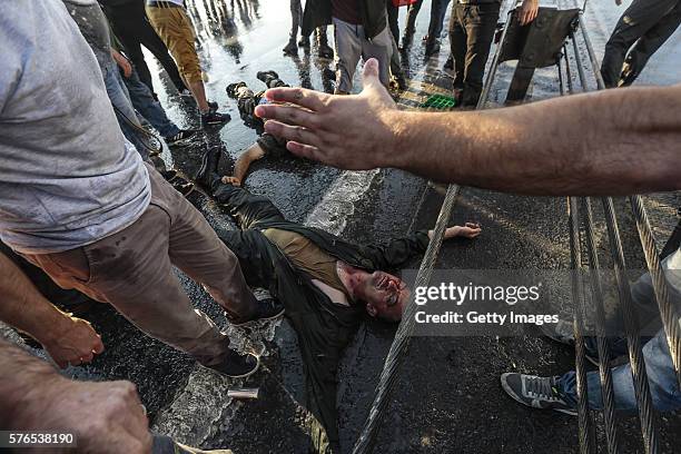 Dead bodies lie on the ground on IBosphorus bridge on July 16, 2016 in Istanbul, Turkey. Istanbul's bridges across the Bosphorus, the strait...