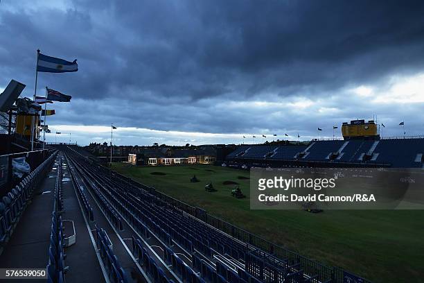 General View of the 18th hole and grandstands as Greenkepers prepare the course prior to the start of the third round on day three of the 145th Open...
