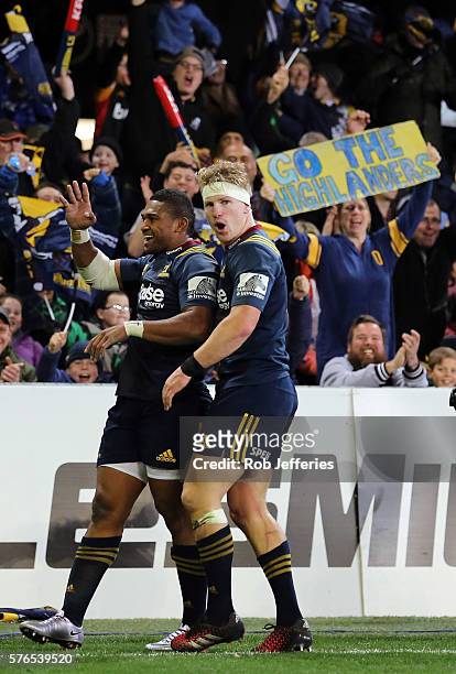Waisake Naholo of the Highlanders celebrates his try with James Lentjes during the round 17 Super Rugby match between the Highlanders and the Chiefs...