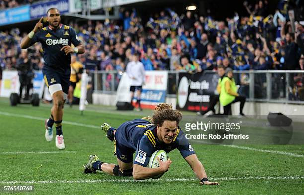 Dan Pryor of the Highlanders scores a try during the round 17 Super Rugby match between the Highlanders and the Chiefs at Forsyth Barr Stadium on...