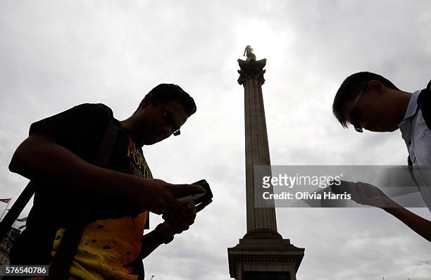 Raam and Po play Pokemon Go, a mobile game that has become a global phenomenon, the day after it's UK release on July 15, 2016 in Trafalgar Square,...