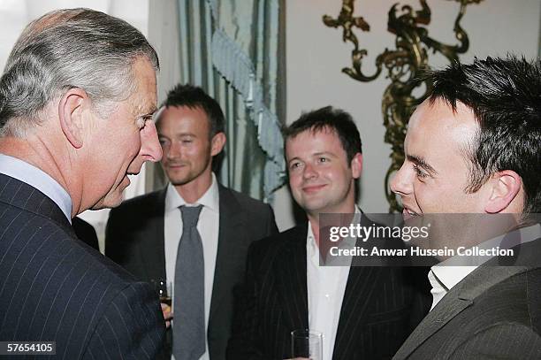 Prince Charles, Prince of Wales talks with TV presenters Declan Donnelly and Ant McPartlin during a reception at Clarence House prior to The Prince's...