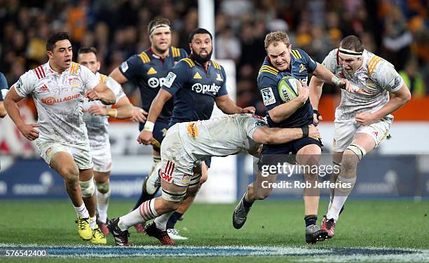 Matt Faddes of the Highlanders on the attack during the round 17 Super Rugby match between the Highlanders and the Chiefs at Forsyth Barr Stadium on...