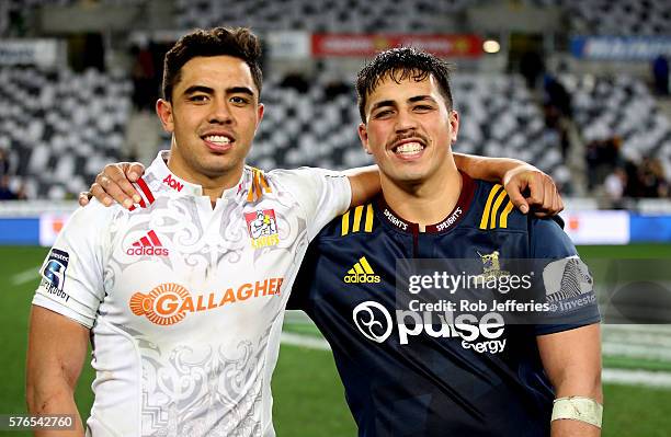 Brothers Anton Lienert-Brown of the Chiefs and Daniel Lienert-Brown of the Highlanders pose for a photo after the round 17 Super Rugby match between...