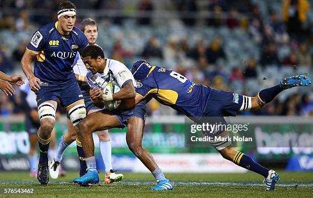 Marcel Brache of the Force is tackled during the round 17 Super Rugby match between the Brumbies and the Force at GIO Stadium on July 16, 2016 in...