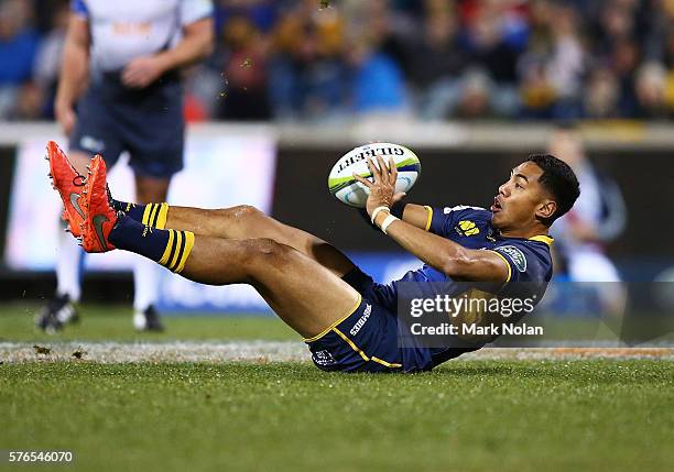 Nigel Ah Wong of the Brumbies looks to offload during the round 17 Super Rugby match between the Brumbies and the Force at GIO Stadium on July 16,...