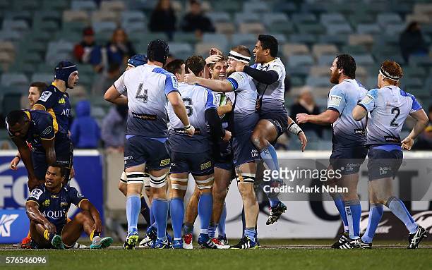 Western Force players celebrate a try during the round 17 Super Rugby match between the Brumbies and the Force at GIO Stadium on July 16, 2016 in...