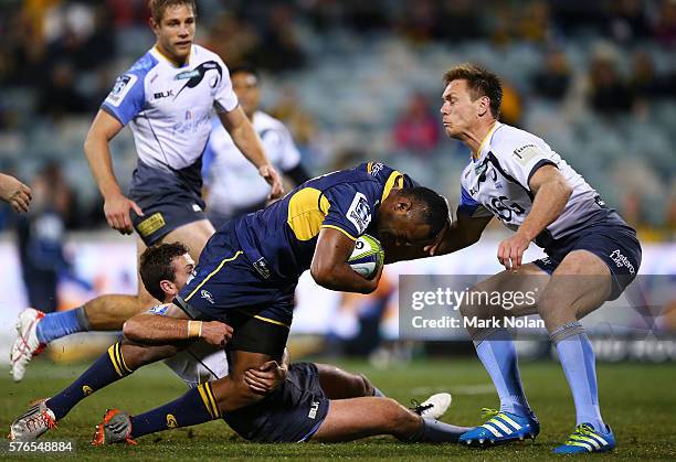 Tevita Kuridrani of the Brumbies is tackled during the round 17 Super Rugby match between the Brumbies and the Force at GIO Stadium on July 16, 2016...