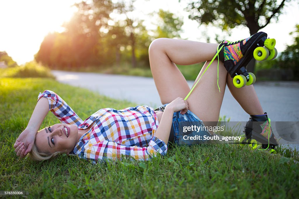 Girl lying down in grass