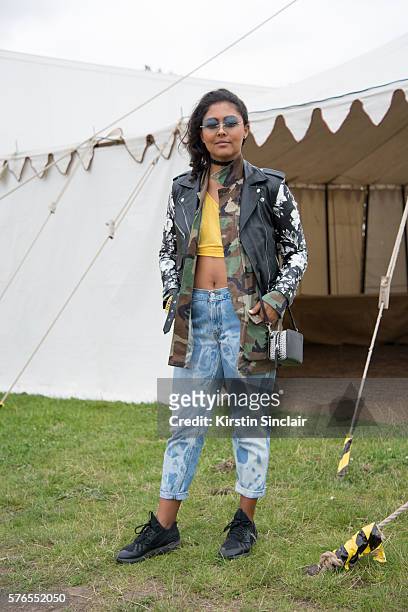 Music producer Monna Mansour wears a reclaimed vintage leather jacket, Beyond Retro Army jacket, Zara top, Levi's jeans, Adidas trainers, Calvin...