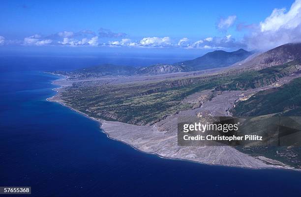 Aerial views of the slopes of the Soufriere Hills showing the destruction and complete loss of the capital of Monserrat, Plymouth and St. Patrick's...