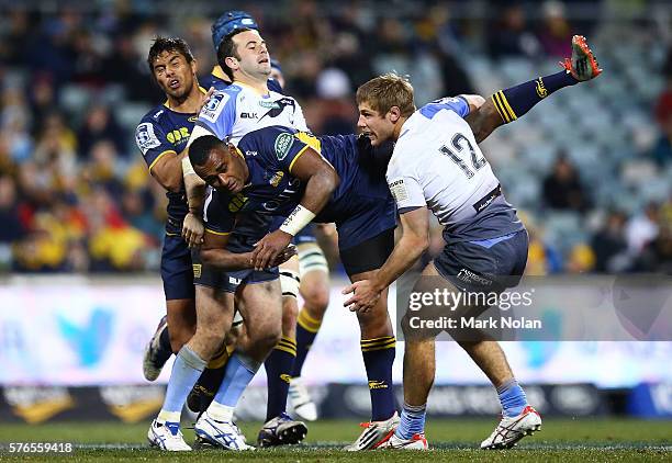 Tevita Kuridrani of the Brumbies is tackled without the ball during the round 17 Super Rugby match between the Brumbies and the Force at GIO Stadium...