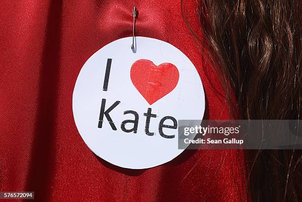 Participant dressed as singer Kate Bush from her 1978 video to her song "Wuthering Heights" wears an "I love Kate" pin prior to attempting to create...