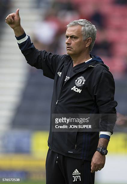 Manchester United's Portuguese manager Jose Mourinho reacts during the pre-season friendly football match between Wigan Athletic and Manchester...