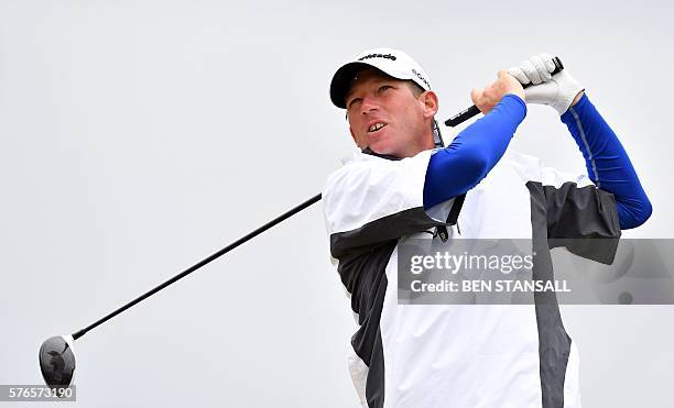 Golfer Jim Herman watches his drive from the 6th tee during his third round on day three of the 2016 British Open Golf Championship at Royal Troon in...