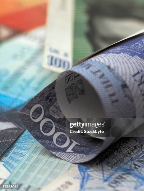 Roled Note Closeup Of A Rolled Bank Note High-Res Stock Photo - Getty Images