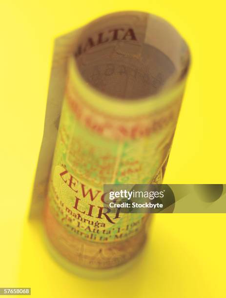 Roled Note Closeup Of A Rolled Bank Note High-Res Stock Photo - Getty Images