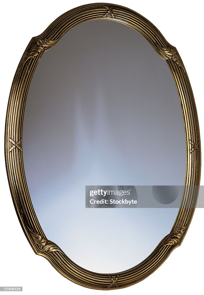 A golden framed mirror