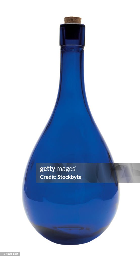 Close-up of a blue glass bottle