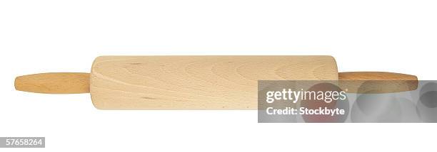 a rolling pin - deegrol stockfoto's en -beelden