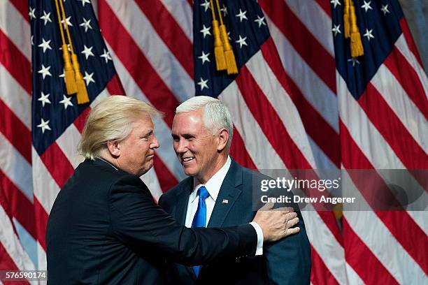 Republican presidential candidate Donald Trump introduces his newly selected vice presidential running mate Mike Pence, governor of Indiana, during...