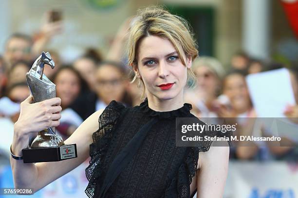Actress Elena Radonicich poses with the Giffoni Award on July 16, 2016 in Giffoni Valle Piana, Italy.