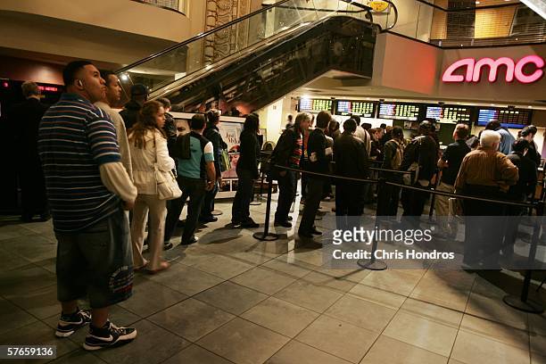 Fans wait in line to buy remaining tickets to popular movies including "The Da Vinci Code" May 19, 2006 at the AMC Theaters on 42nd Street in New...