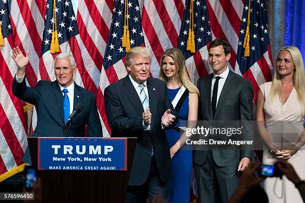 Newly selected vice presidential running mate Mike Pence, governor of Indiana, Republican presidential candidate Donald Trump, daughter Ivanka Trump,...