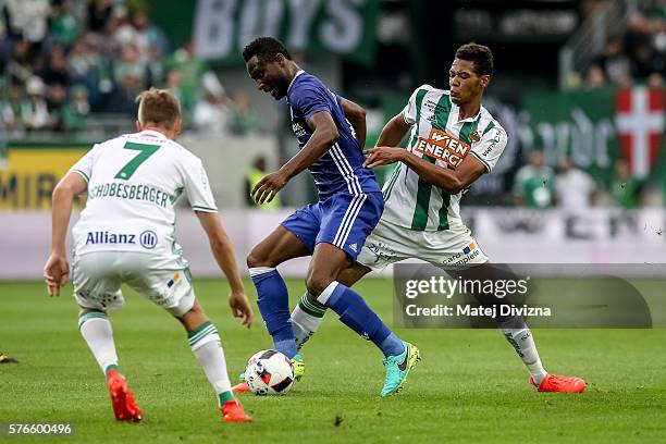 Jon Obi Mikel of Chelsea competes for the ball with Joelinton of Rapid Vienna during an friendly match between SK Rapid Vienna and Chelsea F.C. At...