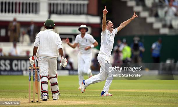 England bowler Chris Woakes celebrates after taking the wicket of Pakistan batsman Sarfraz Ahmed for his 10th wicket in the match during day three of...