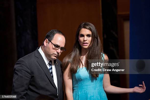 Trump campaign communications director Hope Hicks stands onstage at the end of an event with Republican presidential candidate Donald Trump and his...