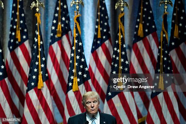 Republican presidential candidate Donald Trump pauses while speaking before introducing his newly selected vice presidential running mate Mike Pence,...