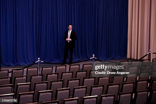 Secret Service agent stands guard prior to the start of an event with Republican presidential candidate Donald Trump and his newly selected vice...