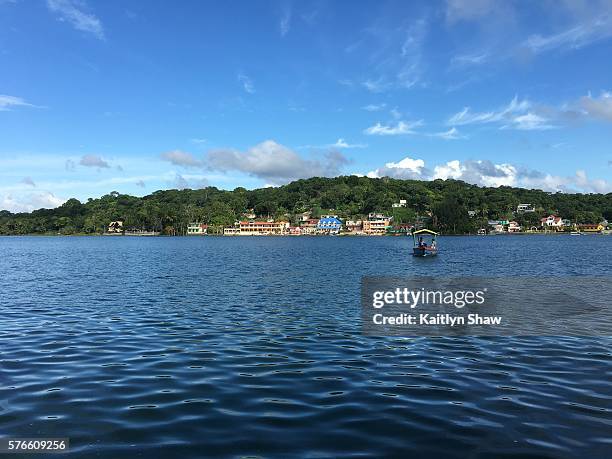 view across lake peten itza - flores stockfoto's en -beelden