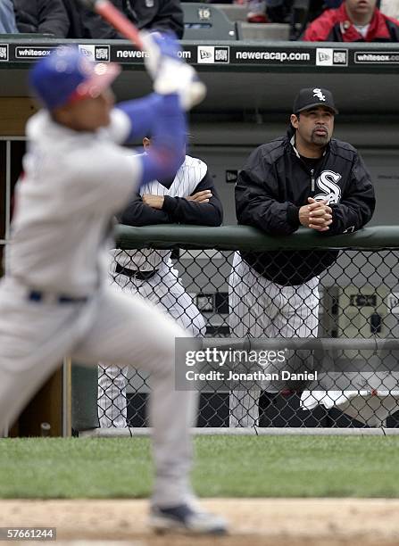 Manager Ozzie Guillen of the Chicago White Sox watches as Ronny Cedeno of the Chicago Cubs bats on May 19, 2006 at U.S. Cellular Field in Chicago,...