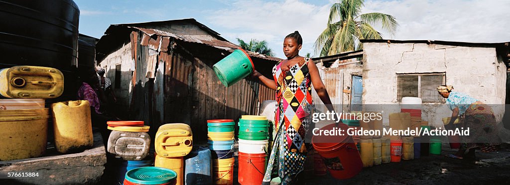 Woman with buckets