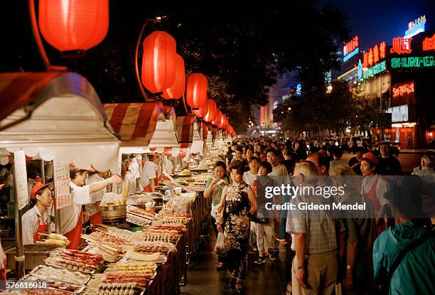 night life on wangfujing street - wangfujing stock pictures, royalty-free photos & images