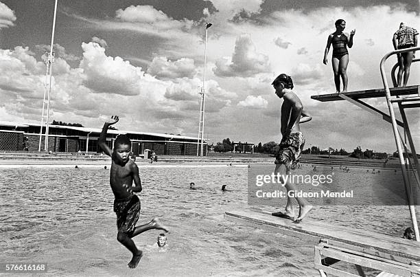 kids swimming at de aar - apartheid stock pictures, royalty-free photos & images