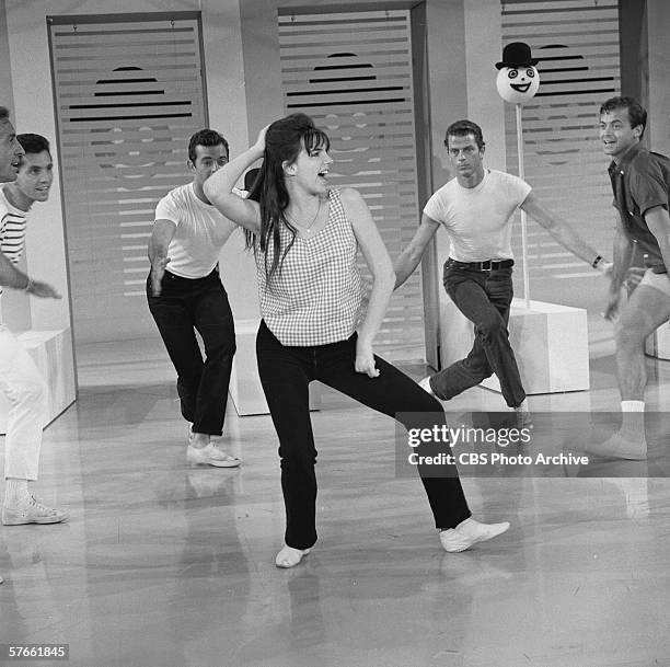 American singer and actress Liza Minnelli rehearses with dancers on the set of her mother's musical variety series, 'The Judy Garland Show,' July 15,...