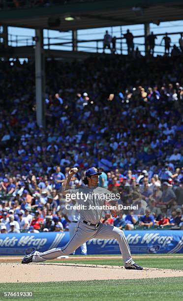 Starting pitcher Yu Darvish of the Texas Rangers delivers the ball against the Chicago Cubs at Wrigley Field on July 16, 2016 in Chicago, Illinois.